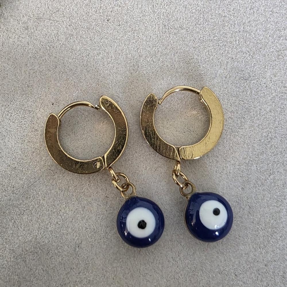 Gold Stainless Steel Huggie Hoop Earrings with Evil Eye Charm - Picture 3 of 17